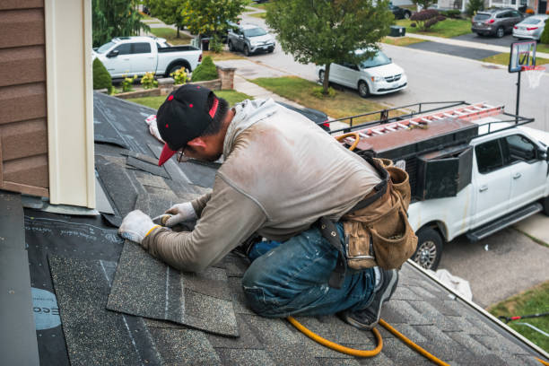 Professional Roof Replacement technician working in Lee, NH